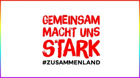 Schriftzug #Zusammenland.